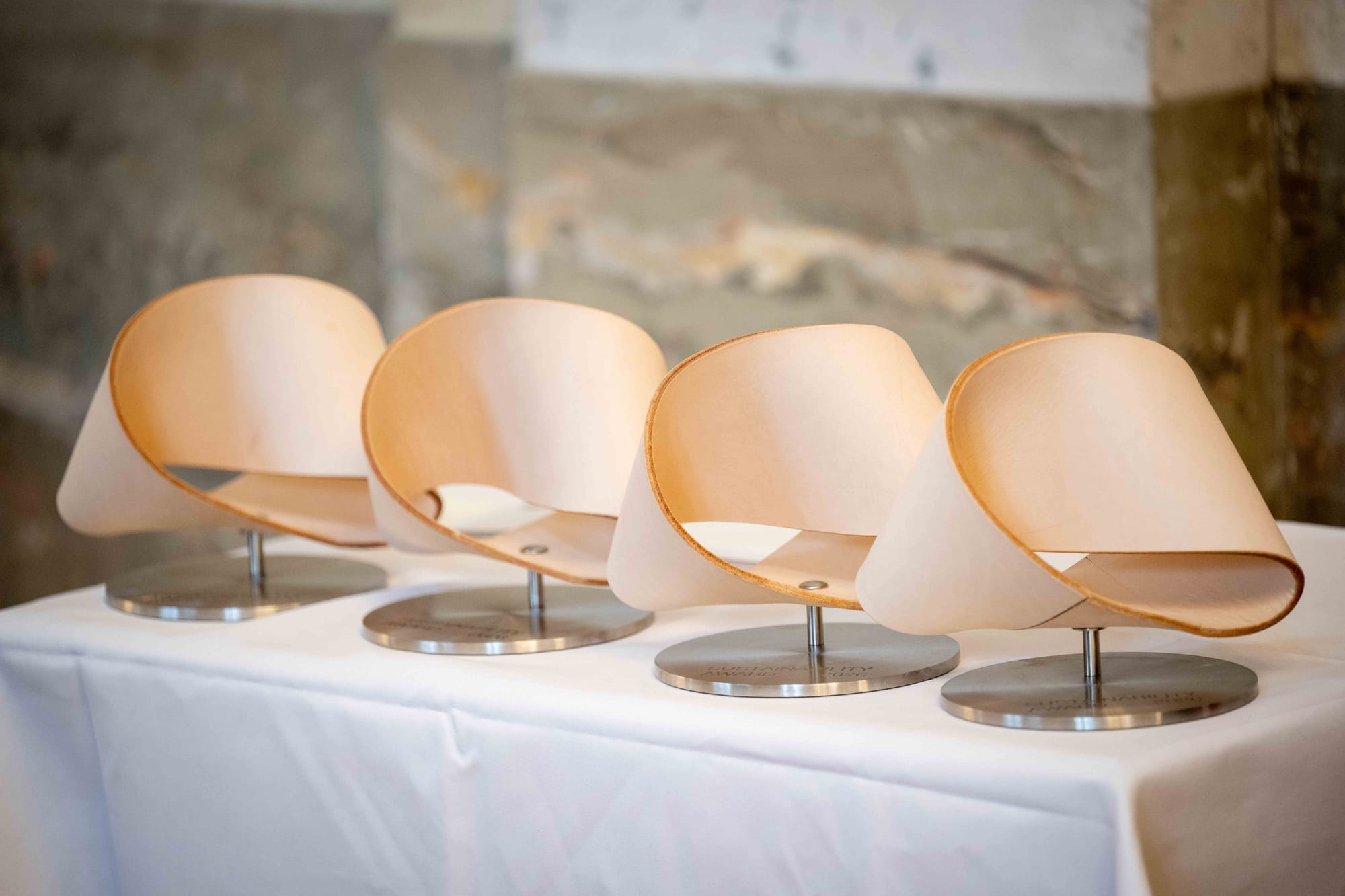 The four gold trophies of the Sustainability Award 2026